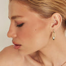 BRINCO PÊNDULO EM NAVETE ABAULADO E VAZADO