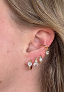PIERCING FAKE COM PONTO DE LUZ PENDENTE