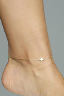 TORNOZELEIRA COM TREVINHO EM PÉROLA E ESTRELINHAS